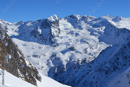 snowy mountains. large snowy mountains against blue sky  nature concept
