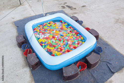 children's fishing pool with toy fish with magnetic hooks © Muhammad