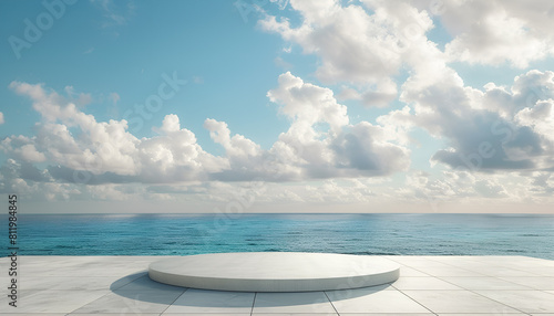 white concrete podium on a tile floor, against a serene ocean and cloudy sky background