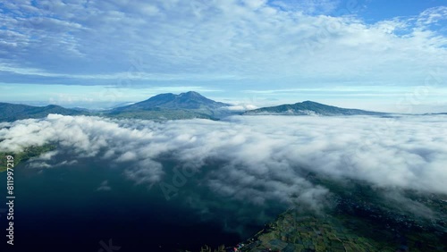 stablish Aerial View of the lake atas with a backdrop of Talang Mountain in Nagari Alahan Panjang, Solok Regency photo