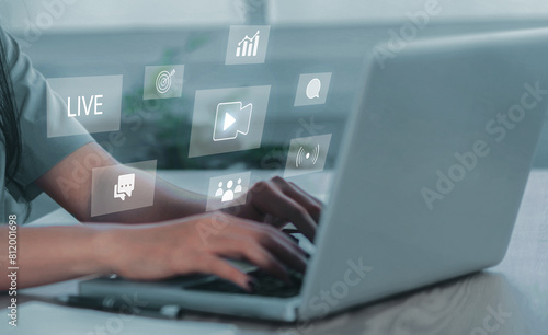 Businesswoman watching live stream video on computer laptop, learning online internet live broadcast communication technology.