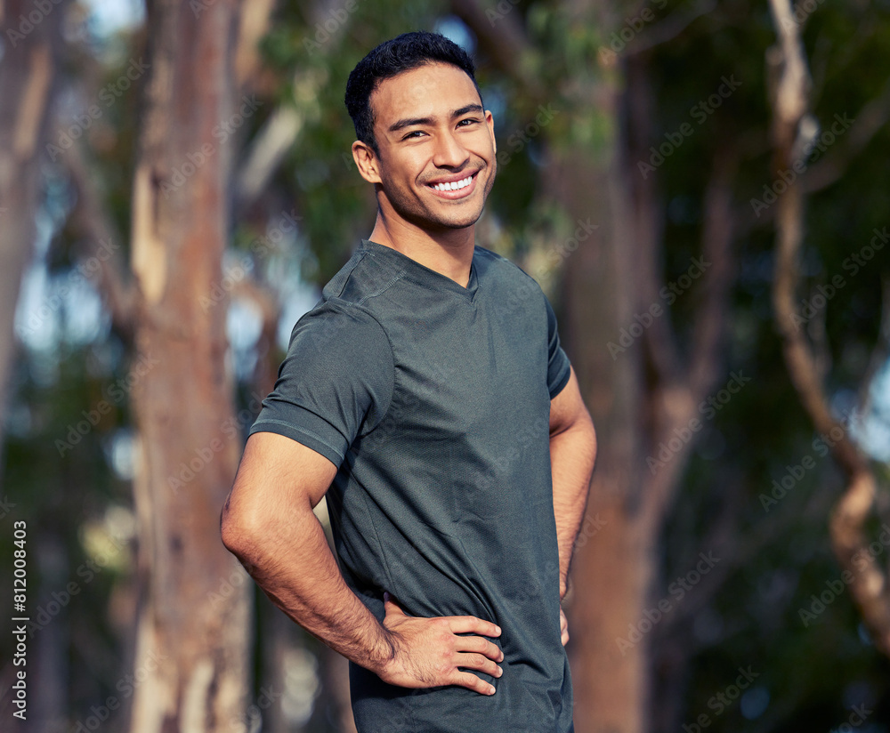 © peopleimages.com - Happy, portrait and man outdoor for fitness training, workout and cardio exercise in morning for routine for wellness. Male runner or athlete, confident and running for health, marathon or race.