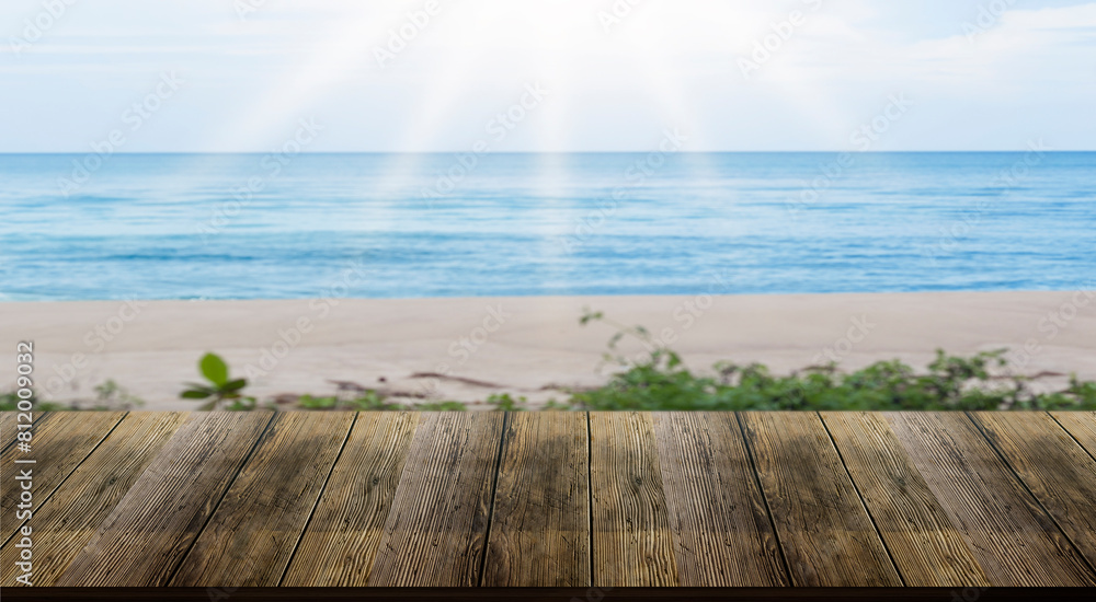 Fototapeta premium Isolated wooden table, blurred background, sea, beach for advertising