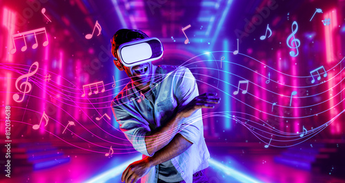 Caucasian man moving to music while using virtual reality glasses. Energetic person with casual cloth enjoy dancing while enter metaverse or simulated world surrounded with music notes. Deviation. © Summit Art Creations