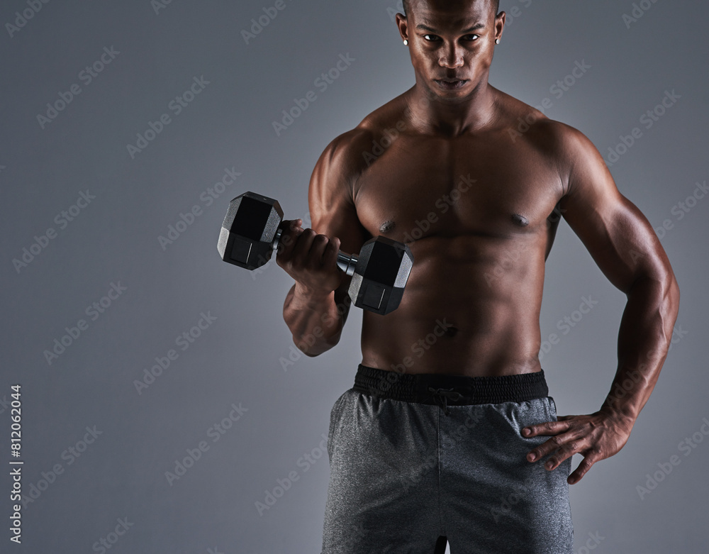 Fitness, black man and weight portrait with trainer, arm muscle and strong with confidence from gym workout. Studio, training and exercise with sport wellness, health and athlete with grey background