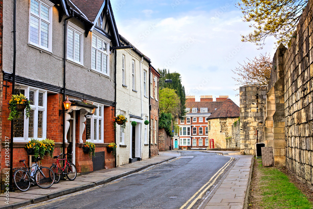 Street along the medieval city walls in the Old Town of York, England Street along the medieval city walls in the Old Town of York, England