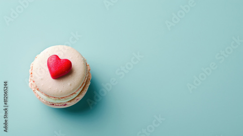 a pastel macaroons with small red heart photo