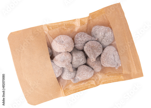 dried baby figs isolated, heap of figs in plastic bag, top view