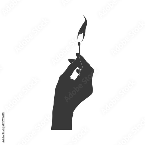 Silhouette hand holding burning match black color only