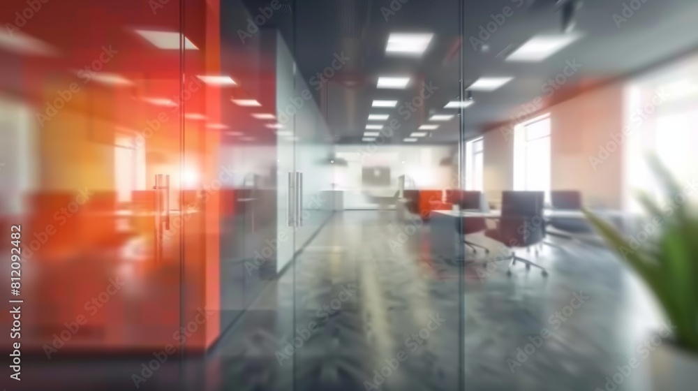 Blurry office setting with a plant in the foreground Blurry office setting with a plant in the foreground