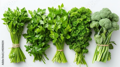 A bunch of green vegetables on a white background. photo
