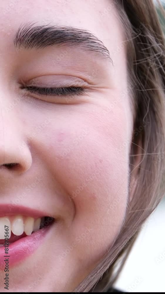 Outdoor closeup portrait, face of happy young beautiful stylish girl, smiling pretty brunette teenager with clean skin, natural cosmetics, makeup, looking at camera, soft smile Outdoor closeup portrait, face of happy young beautiful stylish girl, smiling pretty brunette teenager with clean skin, natural cosmetics, makeup, looking at camera, soft smile