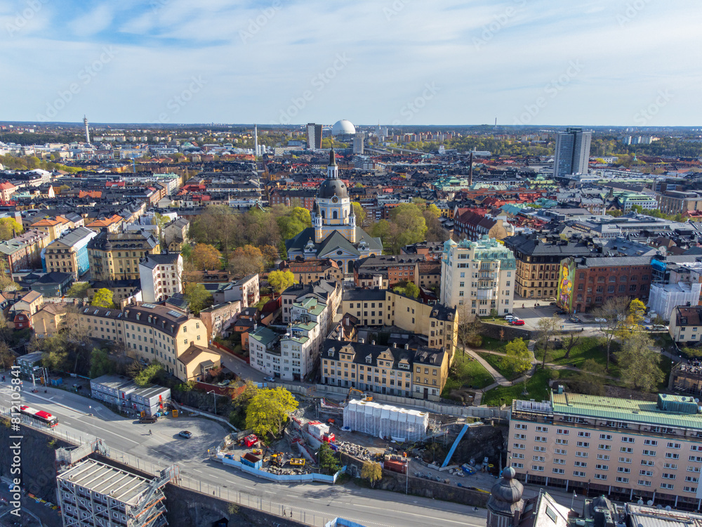 Katarina Church and the area of Södermalm, spring, aerial view, Stockholm, Sweden. In the background Globen in the distance. Typical scandinavian late 19th century buildings.