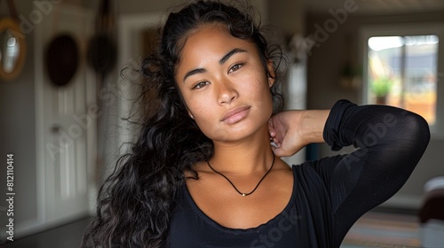 A Pacific Islander woman displaying visible signs of frustration or tension.
