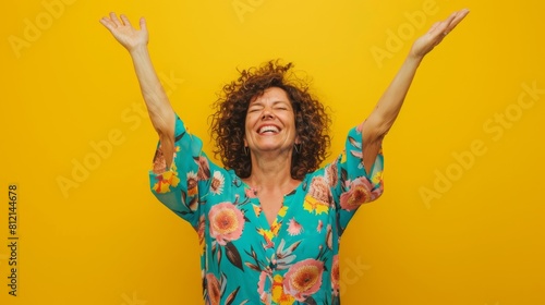 Joyful Woman with Arms Raised photo