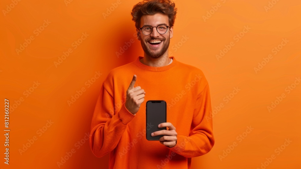 Smiling Man with Orange Smartphone Smiling Man with Orange Smartphone