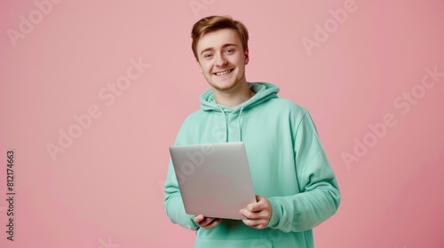 Smiling Man with a Laptop photo