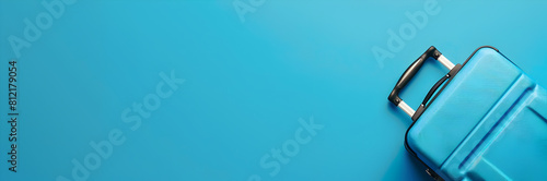 Luggage handle cover web banner. Luggage handle cover isolated on blue background with copy space.