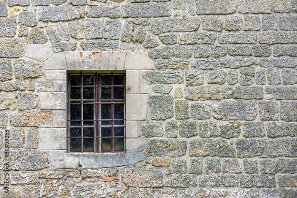 Medieval window at an old ruined building Medieval window at an old ruined building