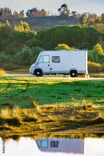 Camper rv camping at lake shore. Alentejo Portugal.