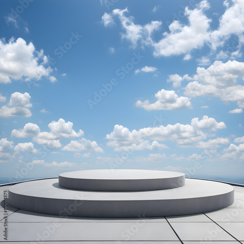 a white platform with a white square on it and a blue sky with clouds.