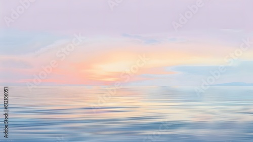 Dreamy sunset over a calm ocean with pastel hues