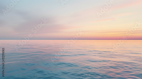 Dreamy sunset over a calm ocean with pastel hues