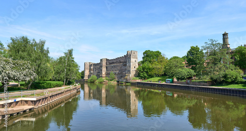 Castle ruins next to a peaceful river