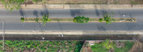 Ashpalt road with nature divide line photo