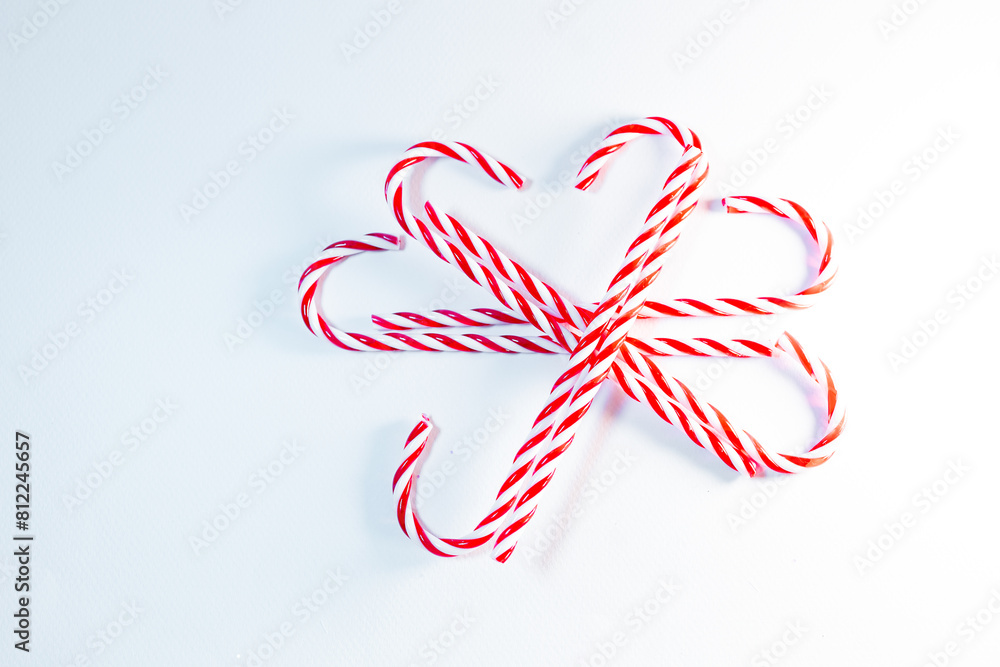 Christmas candy cane in a form of a snowflake Christmas candy cane in a form of a snowflake