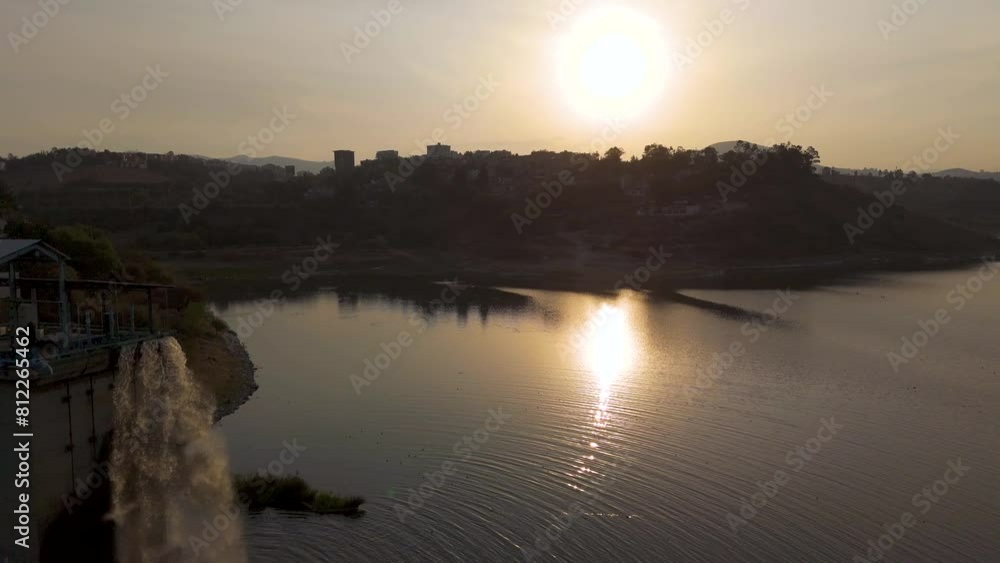 Sundown Reflections: Aerial View of Dam Near Mexico City Suburb, Glistening Waters in Twilight Sundown Reflections: Aerial View of Dam Near Mexico City Suburb, Glistening Waters in Twilight