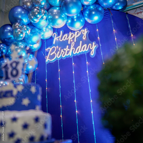 happy birthday, neon lights, blue background, metallic balloons