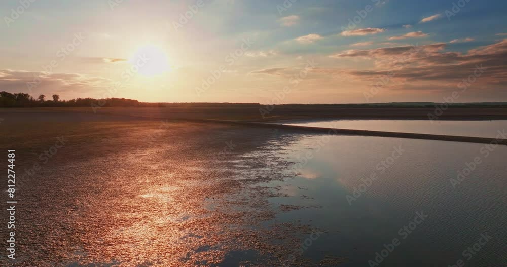 Bird's Eye View of a Drying Lake at Sunset Bird's Eye View of a Drying Lake at Sunset