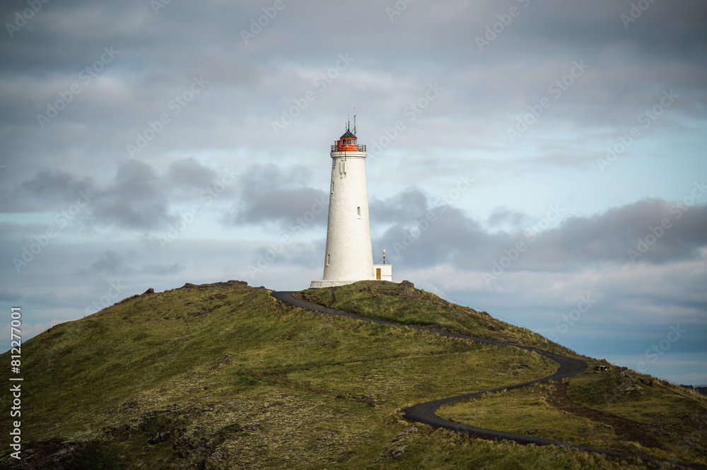 Reykjanes Lighthouse in Iceland with on the hill of peninsula. Landscape scenery