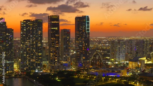 Sunset aerial drone stock video Downtown Miami logos blurred for commercial licensing