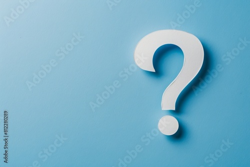 white question mark on a blue background. Place for text