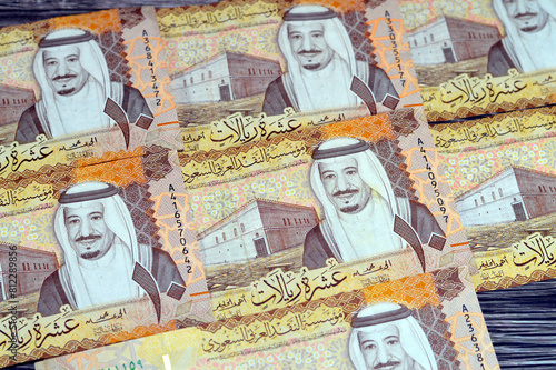 Saudi Arabia 10 SAR ten Saudi riyals cash money banknote with the photo of king Abdullah Bin AbdulAziz Al Saud, Murabba palace and King AbdulAziz Financial District in Al Aqeeq area of Riyadh photo