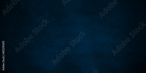 Dark blue stone wall blank backdrop light design. Dark blue or black slate background rock distress texture. High Resolution on dark black  and blue Cement Texture Background. © MdLothfor