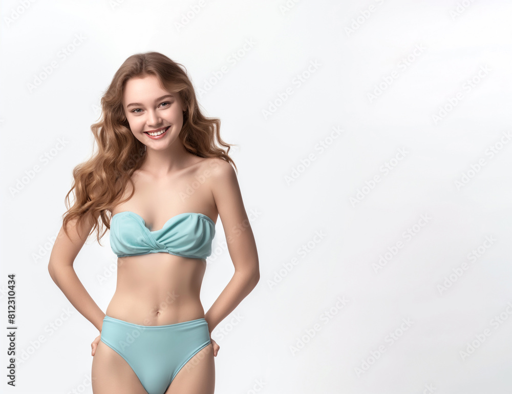 Portrait of smiling young woman in swimsuit isolated on white background, summer-themed designs, copy space Portrait of smiling young woman in swimsuit isolated on white background, summer-themed designs, copy space