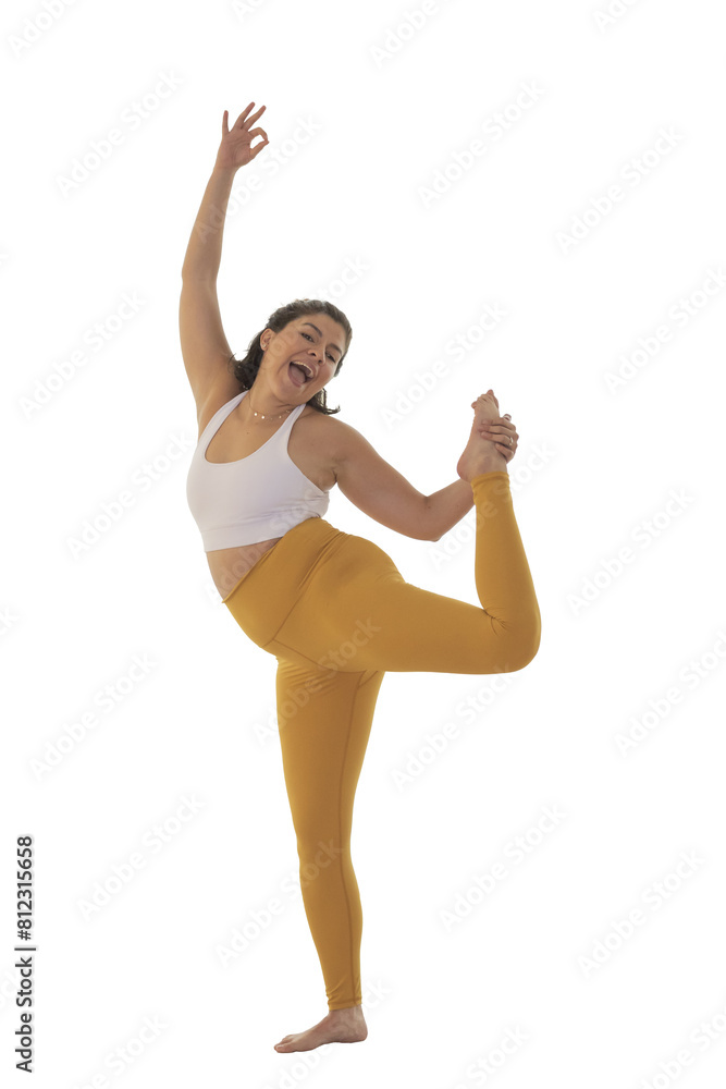 Young cheerful woman doing a standing yoga pose. Not background Young cheerful woman doing a standing yoga pose. Not background