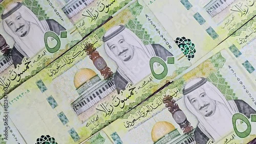 50 fifty Saudi riyals banknote features the dome of the rock in Jerusalem and portrait of king Salman Bin AbdelAziz Al Saud and Al Aqsa mosque in Jerusalem, Saudi Arabia currency, selective focus photo