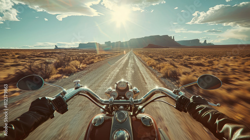 First person perspective on a vintage motorcycle riding a country road in a natural landscape. photo