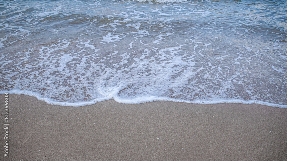 Beautiful Soft blue ocean wave on fine sandy beach Summer background concept Beautiful Soft blue ocean wave on fine sandy beach Summer background concept