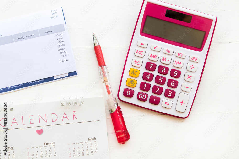 statement of credit card, calendar and calculator for check pay money arrangement flat lay style on background white statement of credit card, calendar and calculator for check pay money arrangement flat lay style on background white