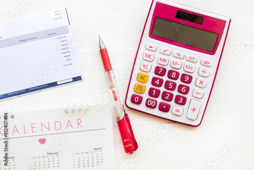 statement of credit card, calendar and calculator for check pay money arrangement flat lay style on background white 