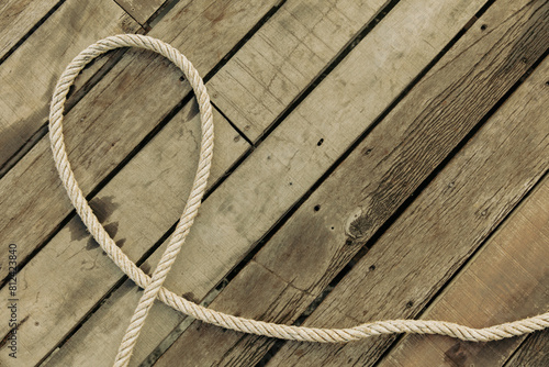 Rope on a wooden background