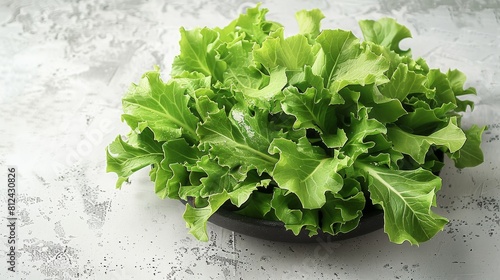 Crisp endive frisee chicory salad on a minimalist white surface, top angle, showcasing fresh green leaves, ideal for a healthy vibe. Generative AI. photo
