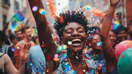 Many happy people having fun in a coffee shop celebrating on the street. A group of men and women having fun at an LGBT festival. Holiday concept. photo