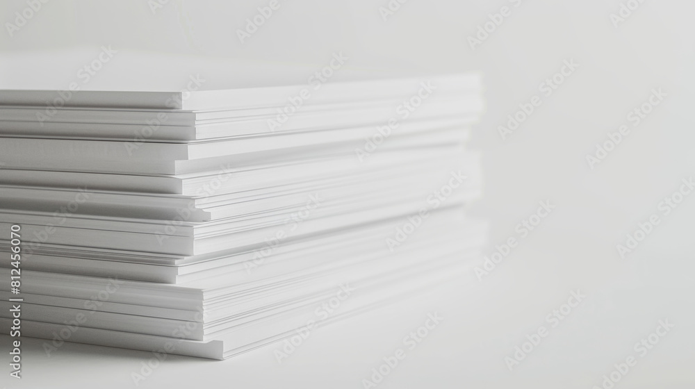 Stack of fresh, untouched white paper against a minimalist white background. Stack of fresh, untouched white paper against a minimalist white background.