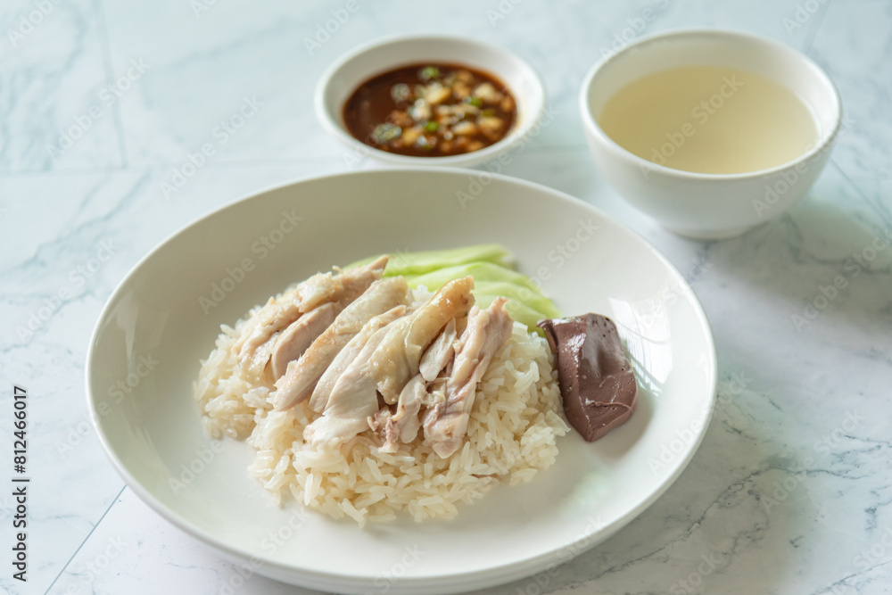 Closed up chicken garlic rice with black soybean and soup, Singapore famous street food Closed up chicken garlic rice with black soybean and soup, Singapore famous street food